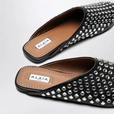 Shop Alaïa Alaia Black Leather Mule Flat With Crystals Women