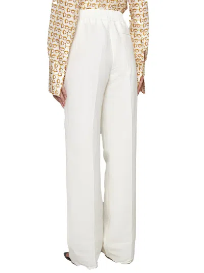 Shop Burberry Trousers In Pfp