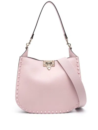 Shop Valentino Garavani Rockstud Leather Hobo Bag In Pink