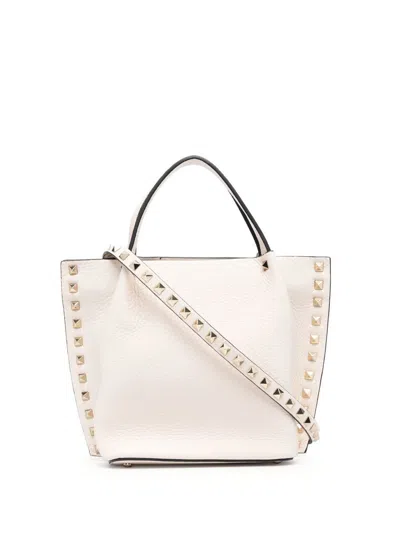 Shop Valentino Garavani Rockstud Small Leather Tote Bag In White