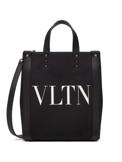 Shop Valentino Garavani Vltn Canvas Tote Bag In Black