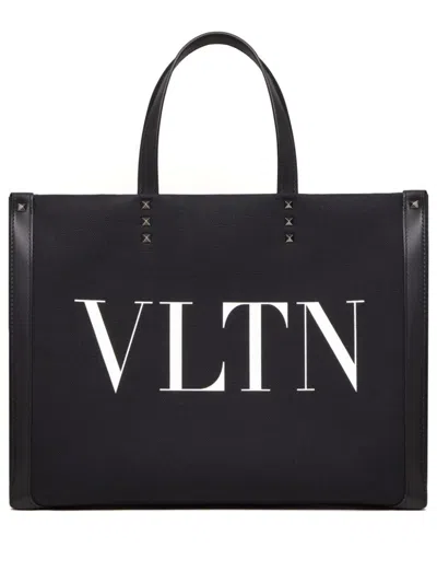 Shop Valentino Garavani Vltn Medium Tote Bag In Black