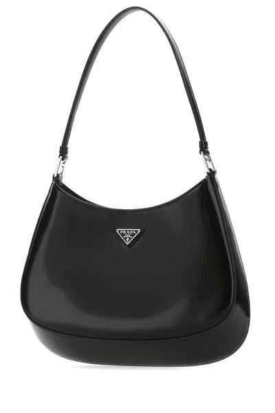 Shop Prada Handbags. In Black