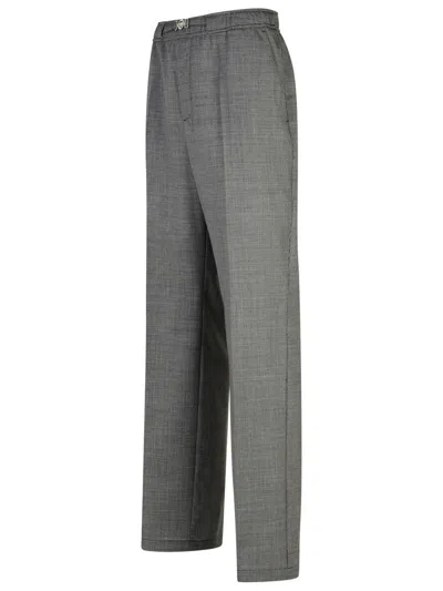 Versace Tapered-leg Houndstooth Wool Pants In Grey