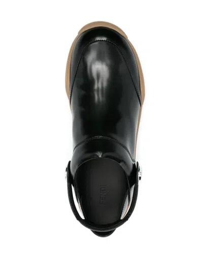 Shop Fendi Clogs With Rotating Strap In Black