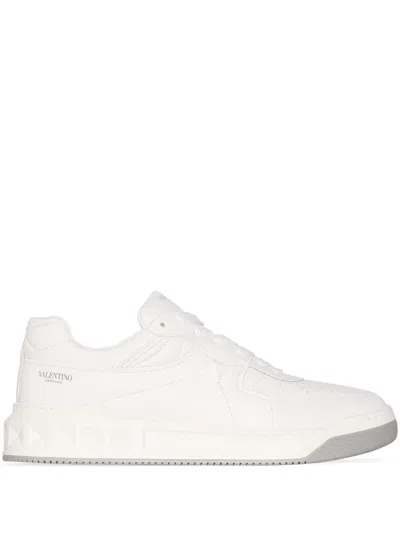 Shop Valentino Garavani Leather Sneakers In White