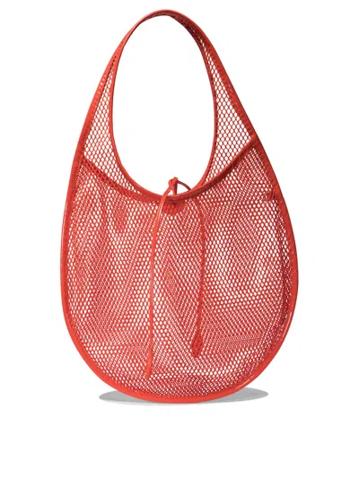 Shop Alaïa One Piece Medium Shoulder Bags Orange