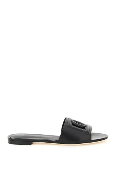 Shop Dolce & Gabbana Leather Slides With Cut-out Logo In Black