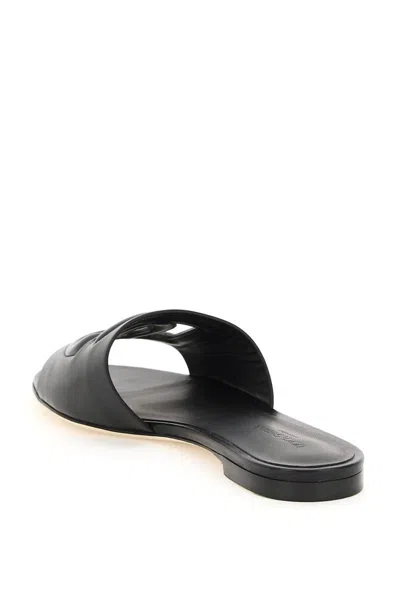Shop Dolce & Gabbana Leather Slides With Cut-out Logo In Black