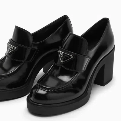 Shop Prada Black Leather Loafers With Metallic Logo Women