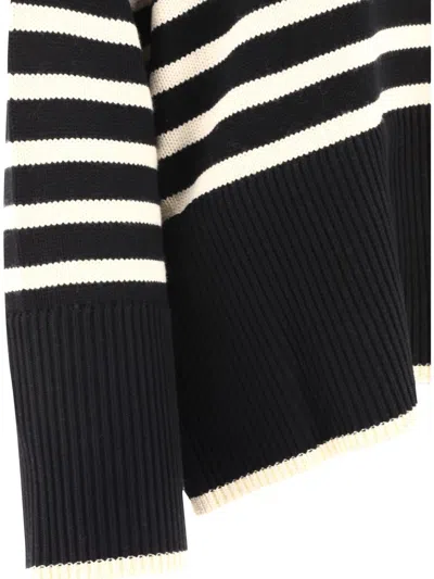 Shop Totême "signature Stripe" Turtleneck Sweater In Black
