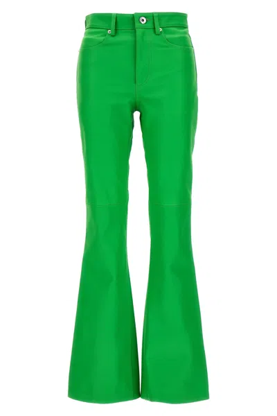 Shop Jw Anderson J.w.anderson Women Leather Bootcut Trousers In Green