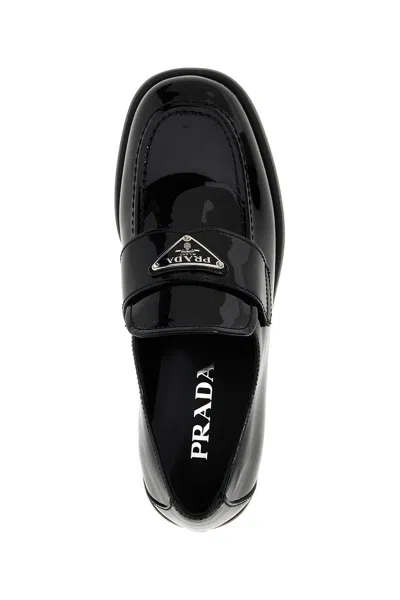 Shop Prada Women Patent Loafers In Black
