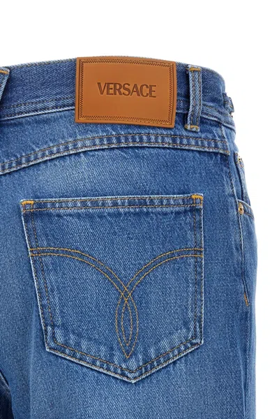 Shop Versace Women Flared Jeans In Blue