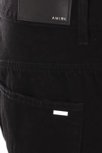 Shop Amiri Jeans In Black