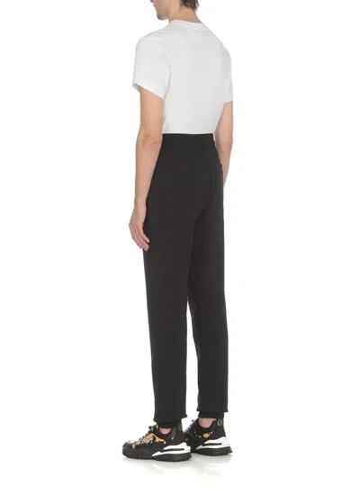 Shop Versace Jeans Couture Trousers In Black