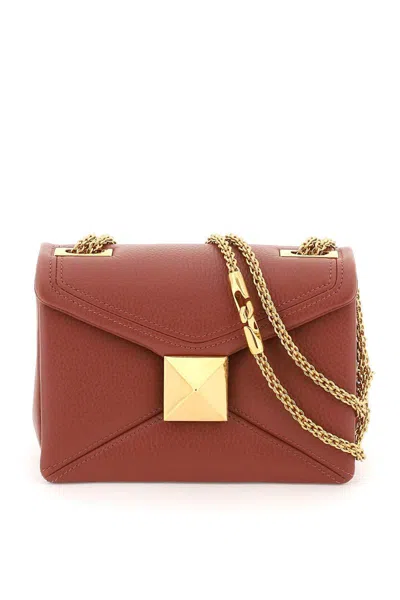 Shop Valentino Grained Leather One Stud Bag With Chain In Rosso