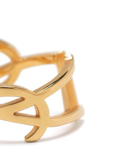 Shop Saint Laurent Women Opyum Twist Ring In Metal In Gold