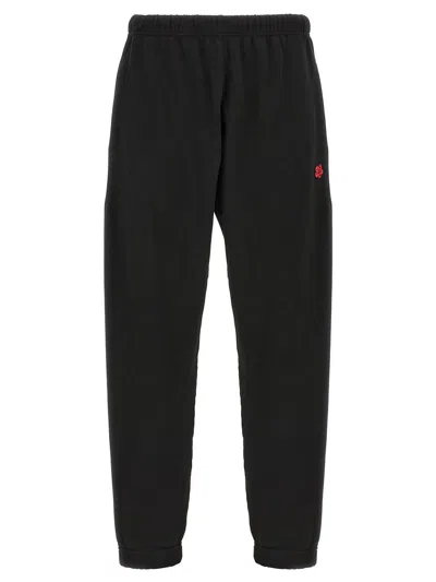 Shop Kenzo Trousers In Black