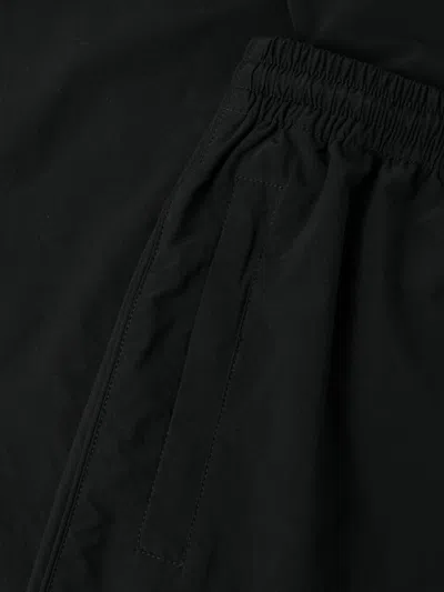 Alexander Wang Embossed Logo Pants In Black