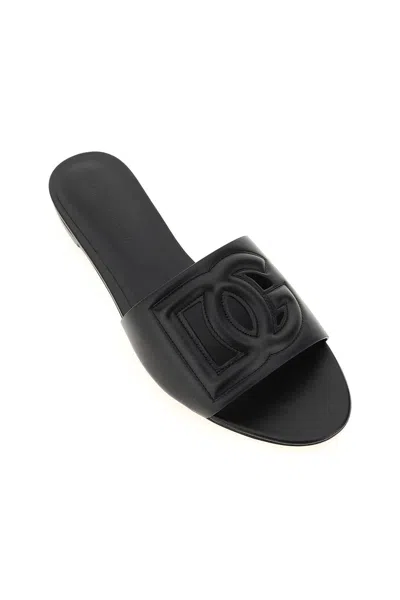 Shop Dolce & Gabbana Leather Slides With Cut Out Logo