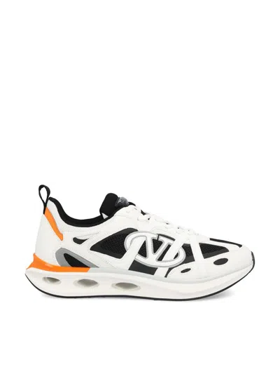 Shop Valentino Garavani Sneakers In White