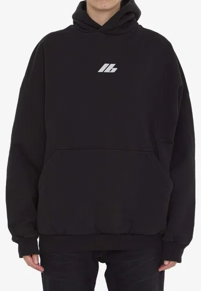 Shop Balenciaga Activewear Logo Oversized Hooded Sweatshirt In Black