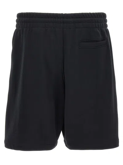 Shop Moschino Logo Bermuda Shorts In Black