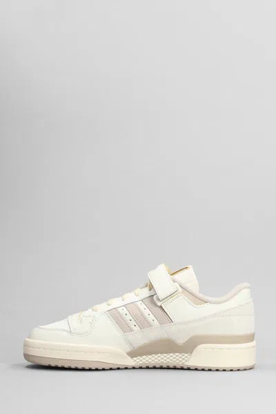 Shop Adidas Originals Adidas Forum 84 Low Sneakers In Beige