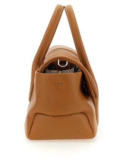 Shop Tod's Reverse Ew Flap Small "di Bag" Bag In Buff