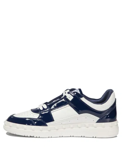 Shop Valentino "freedots" Sneakers