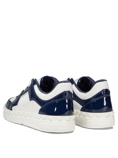 Shop Valentino "freedots" Sneakers