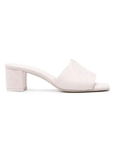 Alexander Mcqueen 60mm Seal-motif Leather Sandals In Beige