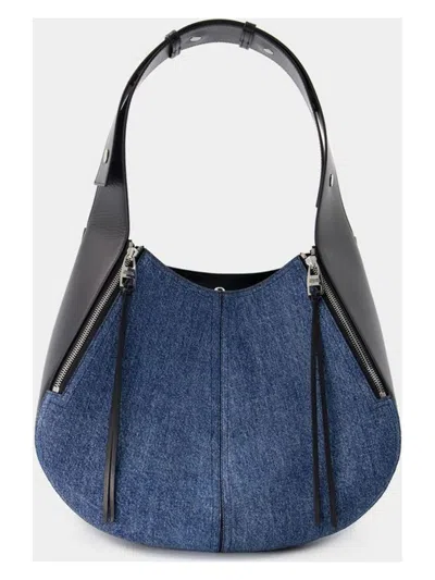 Alexander Mcqueen Skull Biker Denim Hobo Bag In Blue