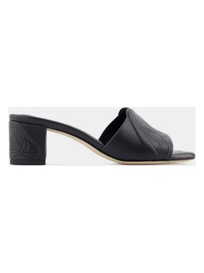 Alexander Mcqueen Black Slip-on Sandals With Embossed Logo In Padded Leather Woman In Black