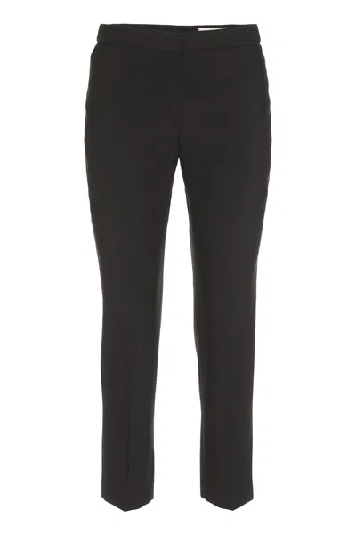Alexander Mcqueen Black Cropped Wool Tailored Trousers For Women In Black