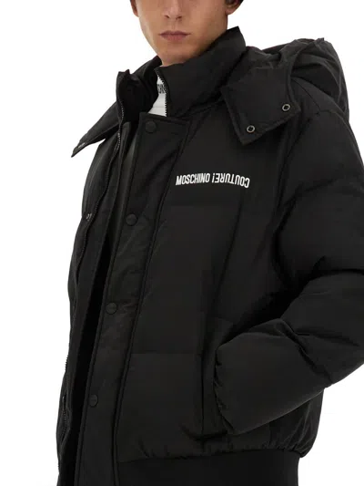 Shop Moschino Down Jacket With Logo In Black