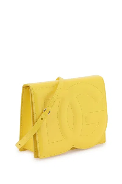 Shop Dolce & Gabbana Dg Logo Crossbody Bag In 黄色的