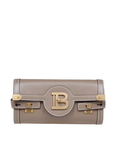 Shop Balmain B-buzz 23 Clutch Bag In Calfskin In Brown