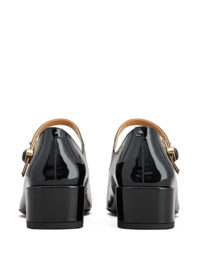 Tod's Almond Toe Block Heel Gold Hardware Pumps In Black