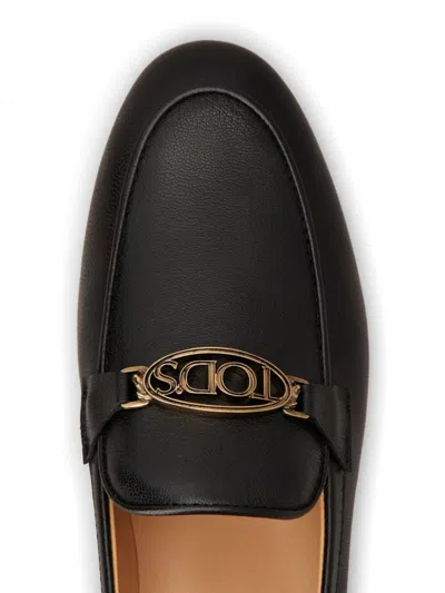 Shop Tod's Oval Logo Leather Loafer Shoes In Black