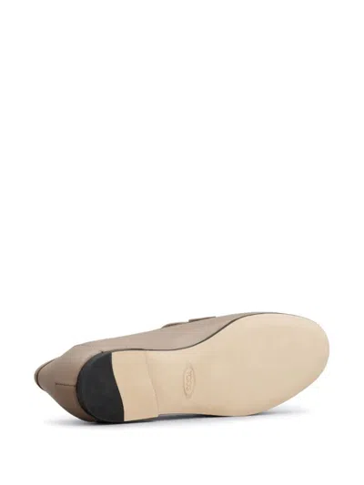Tod's Classic Logo Plaque Leather Loafers For Women In Nude & Neutrals