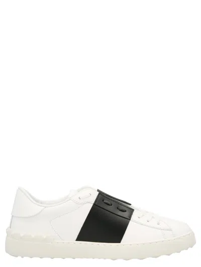 Shop Valentino Garavani  Garavani Rockstud Sneakers In White/black