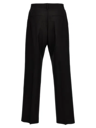 Shop Valentino Garavani  Wool Pants In Black