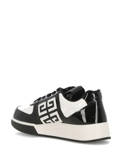 Shop Givenchy Sneakers In Black/white