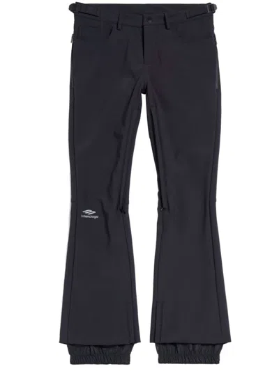 Balenciaga Logo-print Press-stud Flared Trousers In Black