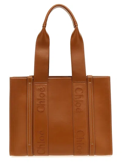 Shop Chloé Medium 'woody' Shopping Bag In Brown