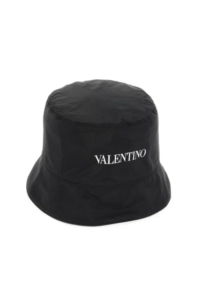 Shop Valentino Garavani Reversible Bucket Hat With Pouch Pocket