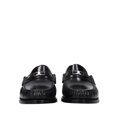 Shop Celine Triomphe Leather Loafers