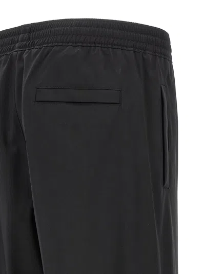 Givenchy Logo Elastic Waistband Pants With Pockets In Black